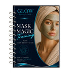 A spiral-bound booklet titled 'GLOW BEAUTY CASE MASK MAGIC Training' on a white background. The cover features a woman wearing a green face mask and a beige towel-wrapped head.